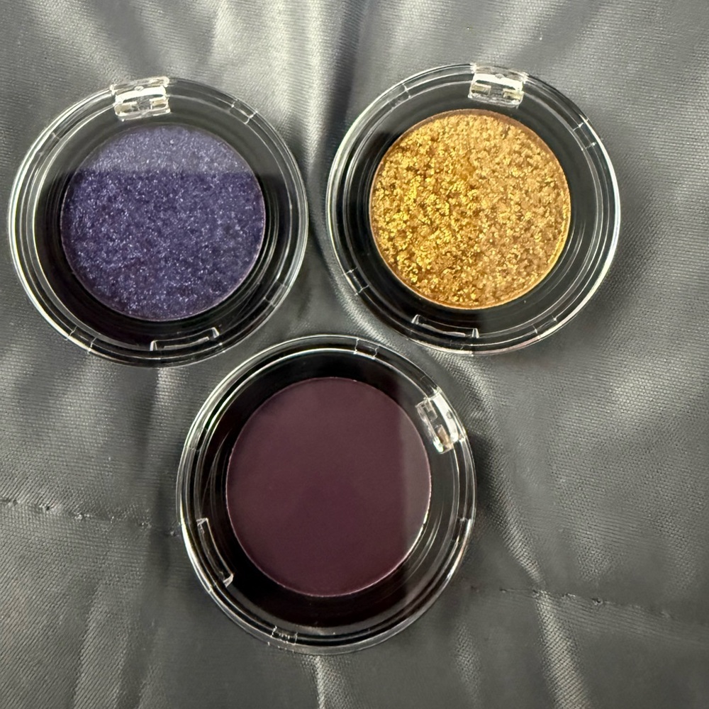 NYX Utopia Eye Shadow Trio - Purple Shimmer, Gold, and Dark Purple